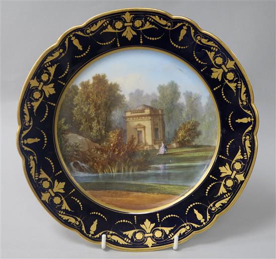 A Sevres cabinet plate, painted with a view titled to underside Pavillon de Musique à Trianon, diam. 24cm